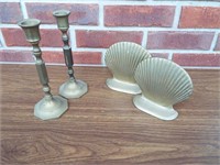 Brass shell design book ends and pair of candle