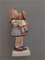 Hummel, figurine 6.25 inches tall named kiss me.