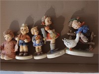 Five hummel figurines , 3 to 4.5" inches tall