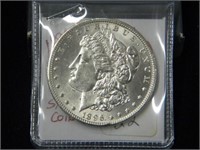 1896 Morgan silver dollar, note says BU &