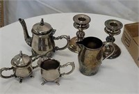 Miniature tea set and candle sticks