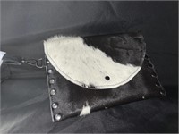 BLACK & WHITE COWHIDE CLUTCH W/ STRAPE - 10 X 7 “