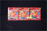 3 Johnny Lightning in package diecast cars