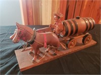 Wooden horses w/ barrel man is broken
