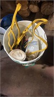 2 buckets full of various garage items and paint