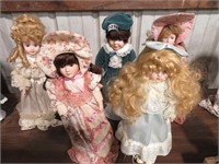 5 porcelain dolls
