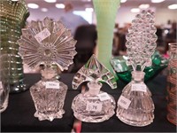 Three vintage crystal perfume bottles: 4 1/2", 7"