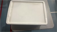 Plastic tub with contents (miscellaneous magnets)