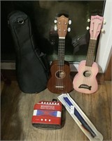 Kids musical instruments 2 ukuleles, concertina,