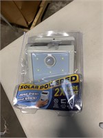 Solar powered wall mount security light