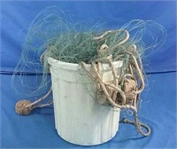 Bucket of fish netting