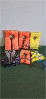 6 assorted life jackets