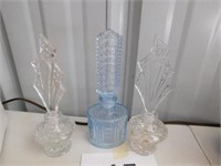 Pair Irice clear glass perfume bottles with