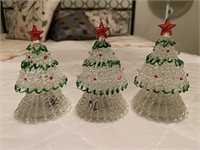 Three glass Christmas tree decorations