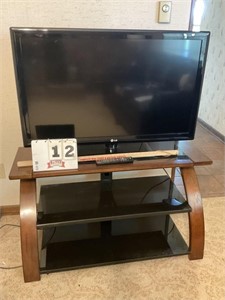LG 42" flatscreen TV w/ TV stand
