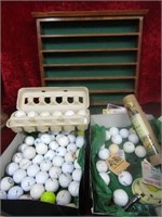 Vintage golf ball collection w/display.