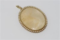 Antique 15ct yellow gold oval open locket pendant
