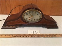 Mantle clock 20 inches wide 8 inches tall-- works