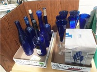 Cobalt blue wine bottles and glass stemware