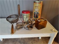 Vingage utensils and advertising cans.