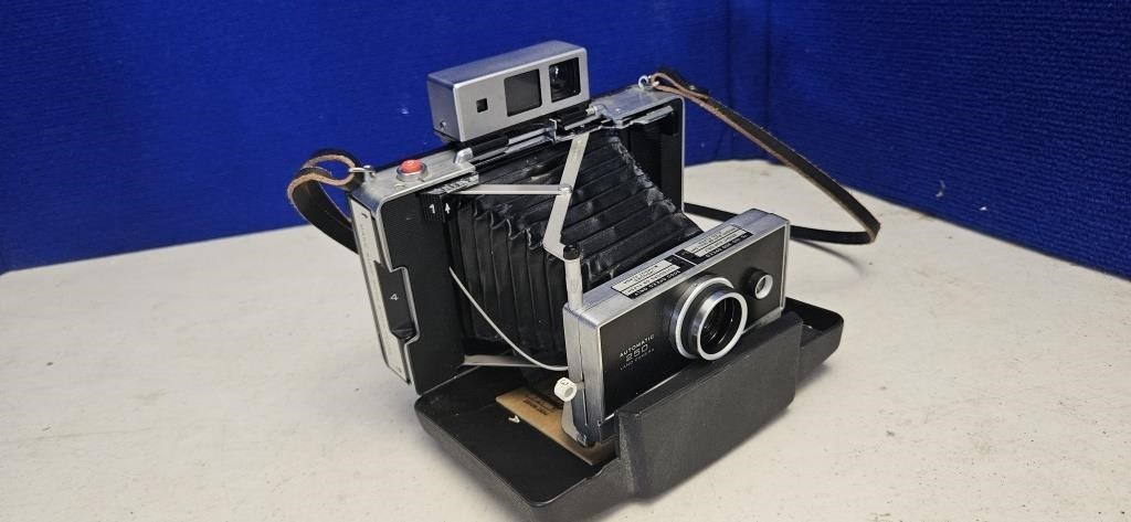 Polaroid 250 land camera. With accessories.