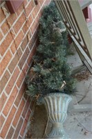 Two Artificial Trees in Planters on Porch