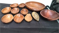 Large group of wooden bowls