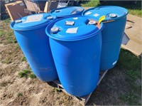 4 blue plastic barrels