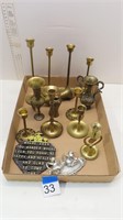 brass colored candlestick holders, assorted decor