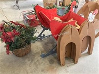 Wooden sleigh with 8) wooden reindeer, etc.