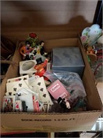 Box of figurines and plain cards