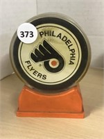 Philadelphia Flyers Hockey Puck In Stand