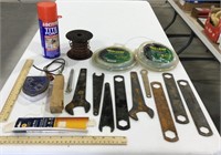 Misc lot w/ wrenches, trimmer line, & lamp wicks