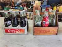 Vintage Coca-Cola bottles and holders
