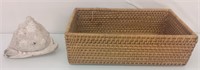 Wicker basket and large shell
