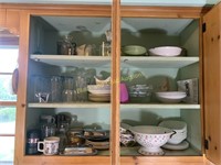 Glassware and dishes in upper cabinet