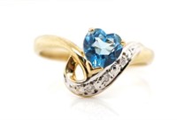 Blue gemstone and diamond set 9ct yellow gold ring