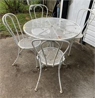 WROUGHT IRON PATIO TABLE AND 4 CHAIRS