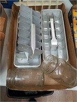 Metal ice cube trays, glass canning jars