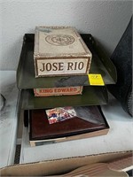 File cabinet, cigar boxes, book