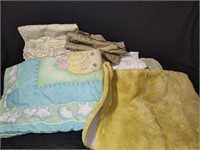 Assortment of Pillow Cases, Blankets. Yellow Rug