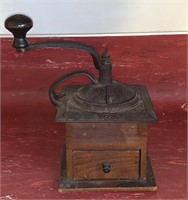 Antique hand crank coffee grinder
