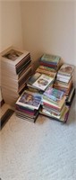 Large assortment hardcover and paperback books,