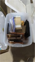 assorted picture frames in tote