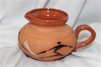 An Art Pottery Creamer