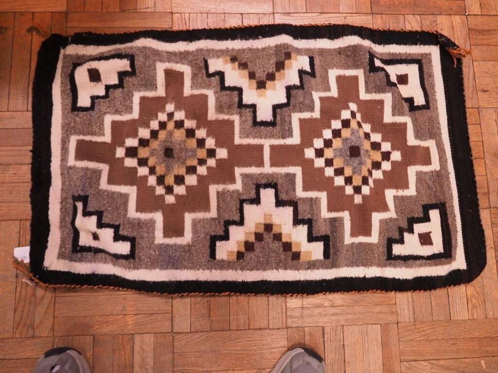 Woven wool Native American-tyle rug in black,