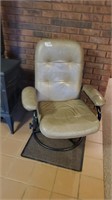 Swivel chair with foot stool