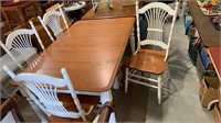 Dining table with four matching chairs - table has