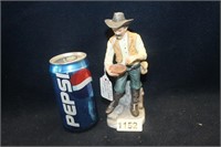 CERAMIC COWBOY FIGURINE