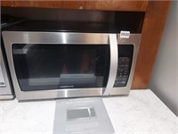 Farberware 1100watt Microwave Oven. Untested.